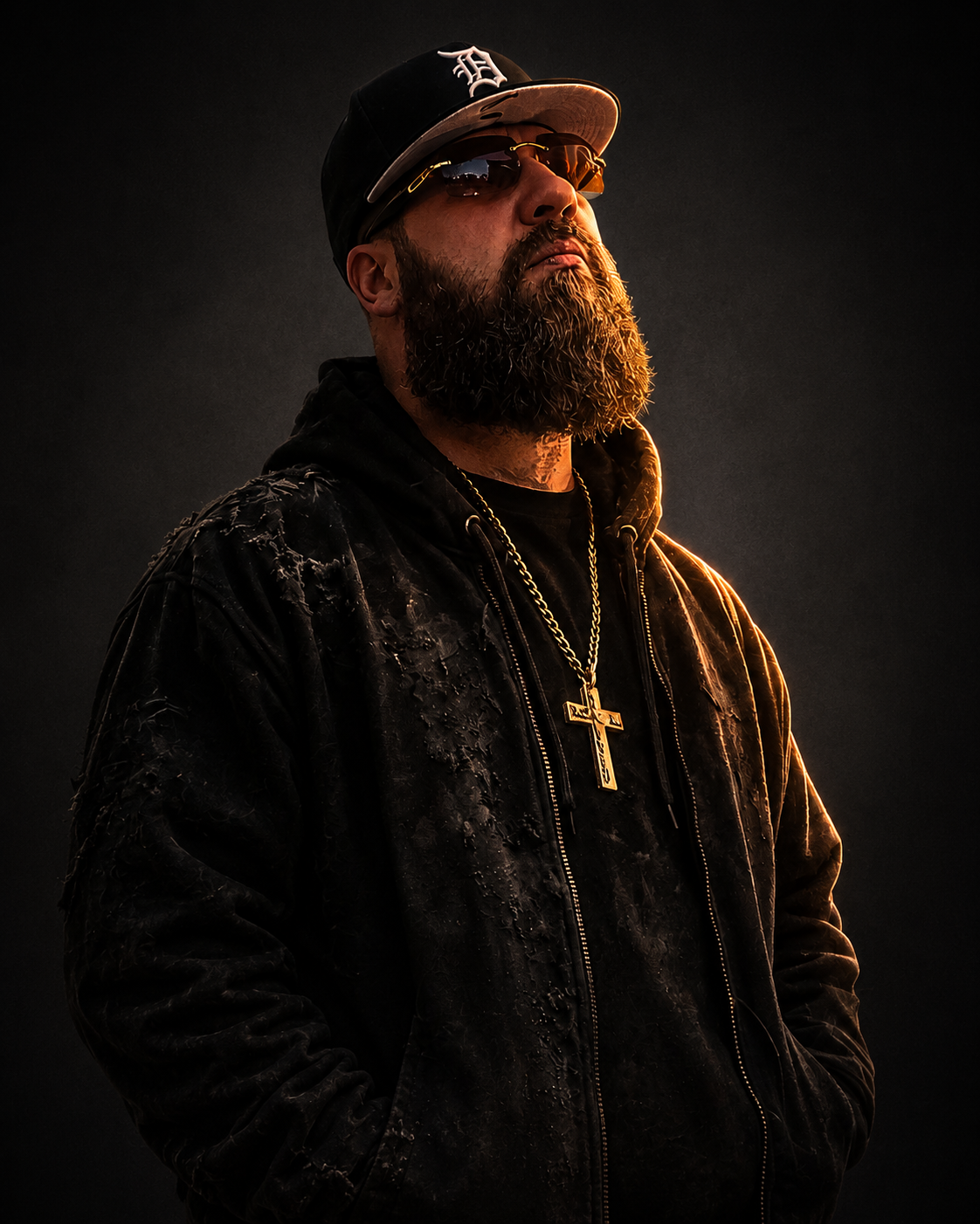 Christian J. wearing Detroit cap and cross necklace